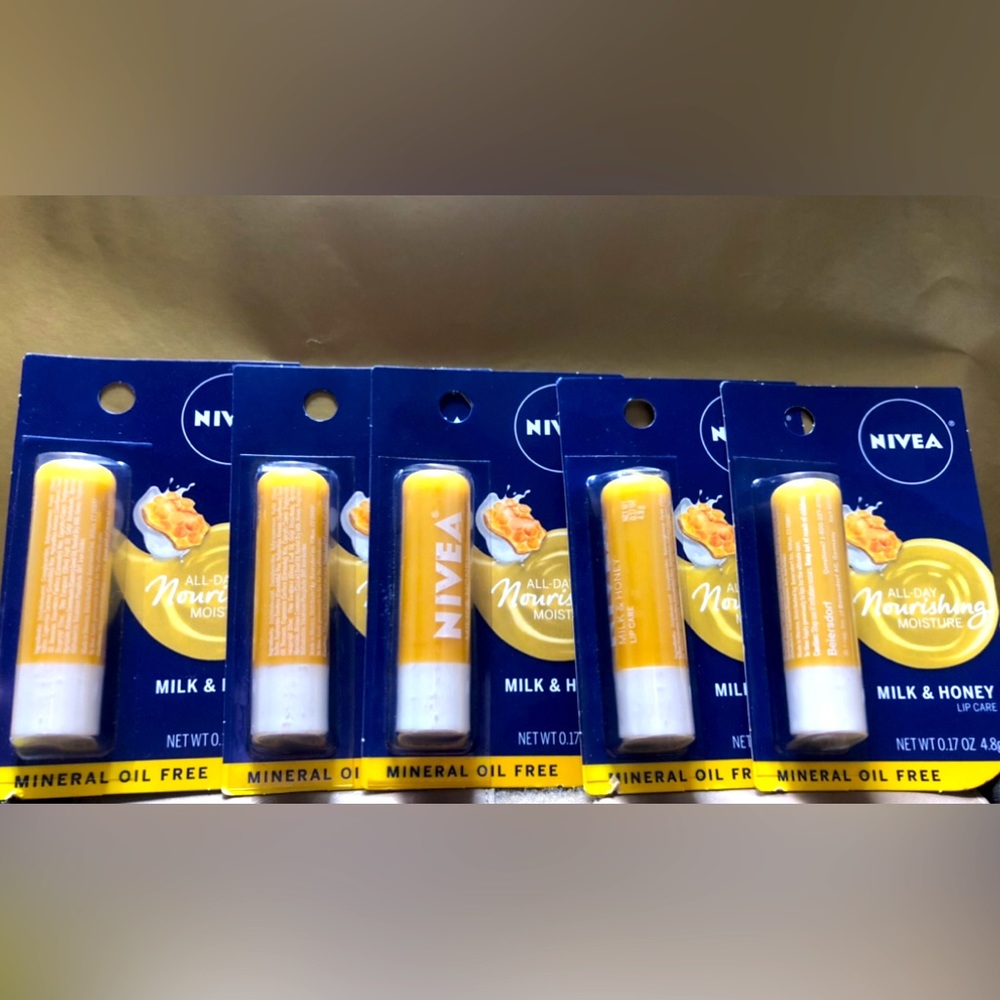 SOLD NIVEA Milk and Honey Lip Care, Moisturizing Lip Balm Sticks w/ Shea Butter